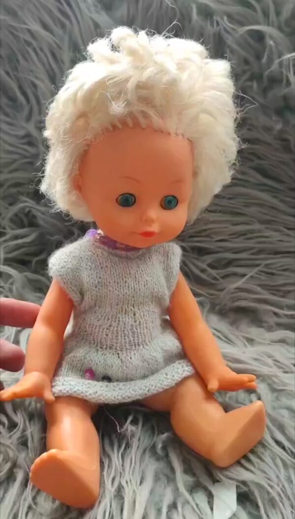 Grey head doll