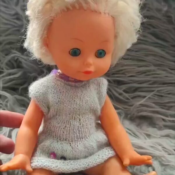 Grey head doll
