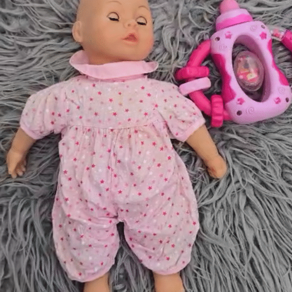 Baby doll with rattle feeder