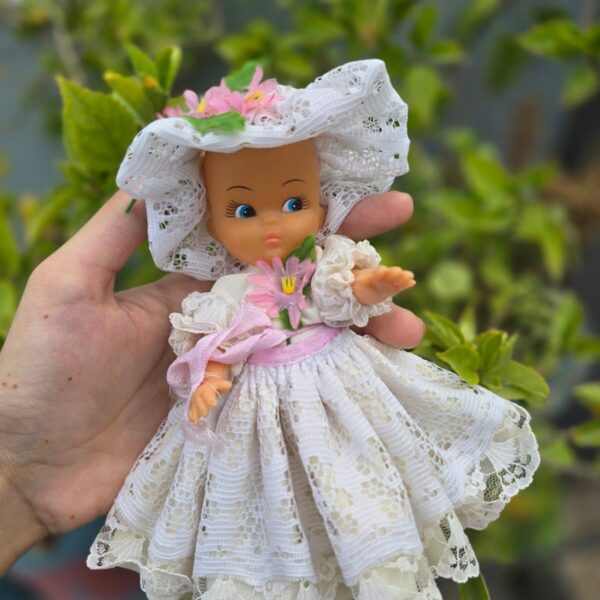 Mini hat doll