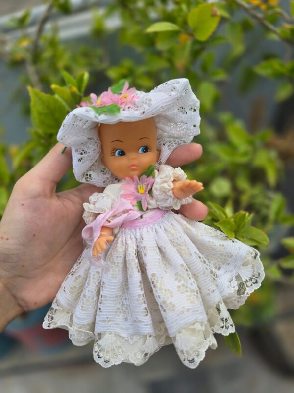 Mini hat doll