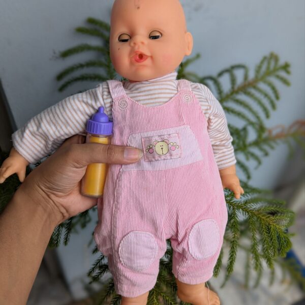Baby doll with feeder